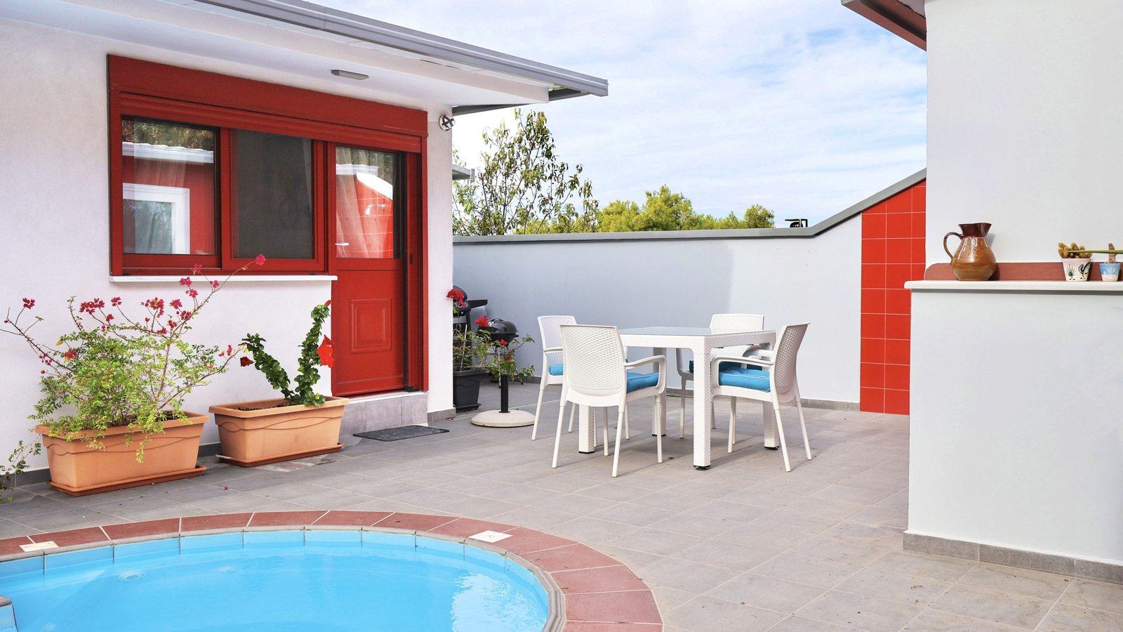 Seating area by the swimming pool