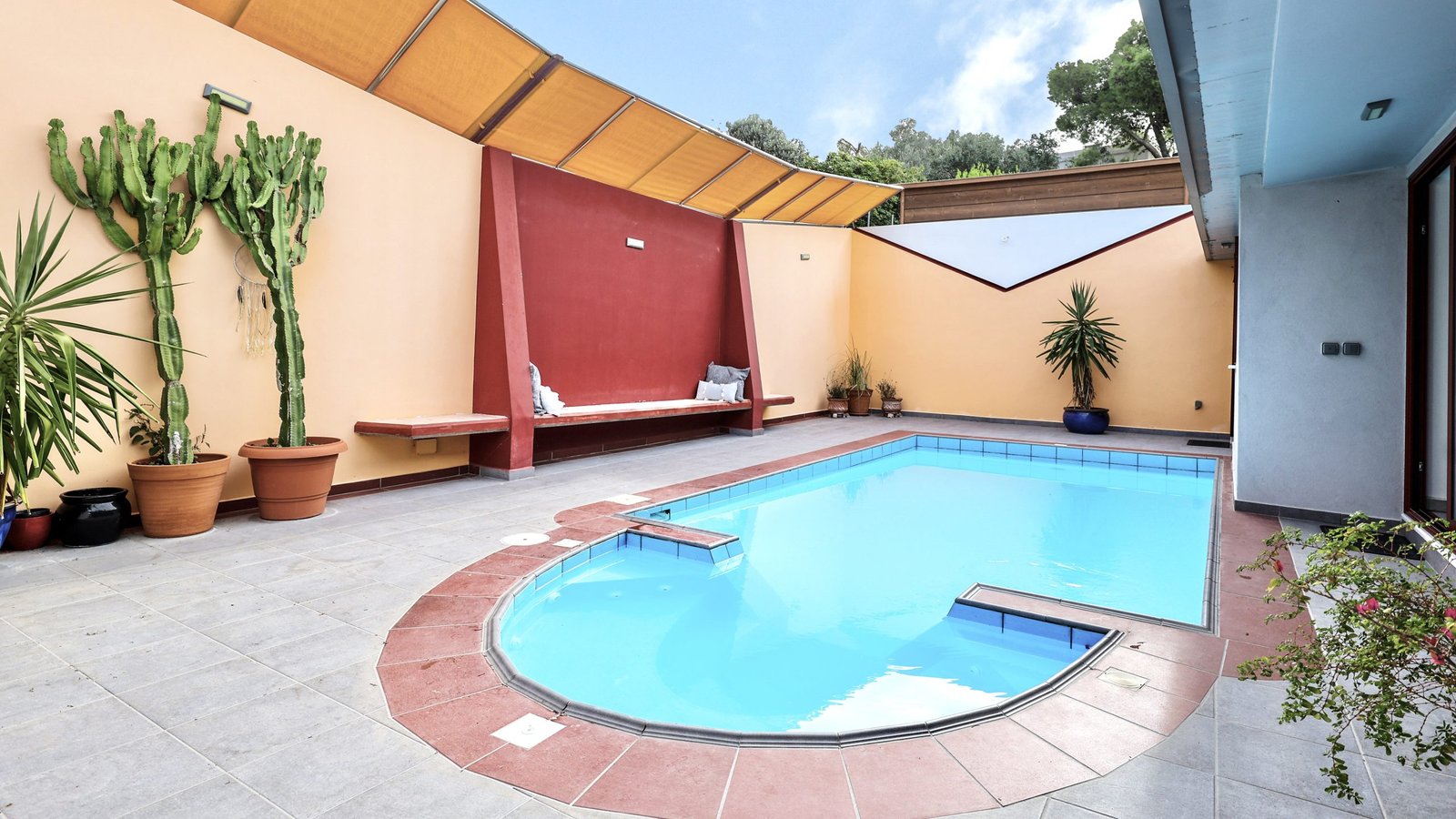 This is the magnificent swimming pool with jacuzzi at The Bordeaux Door