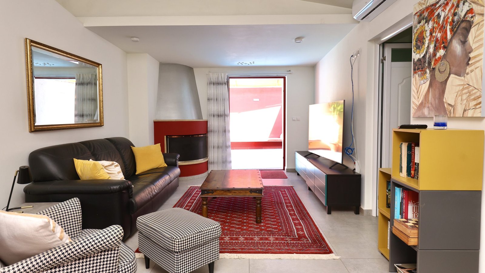 Living room with opening to the pool area