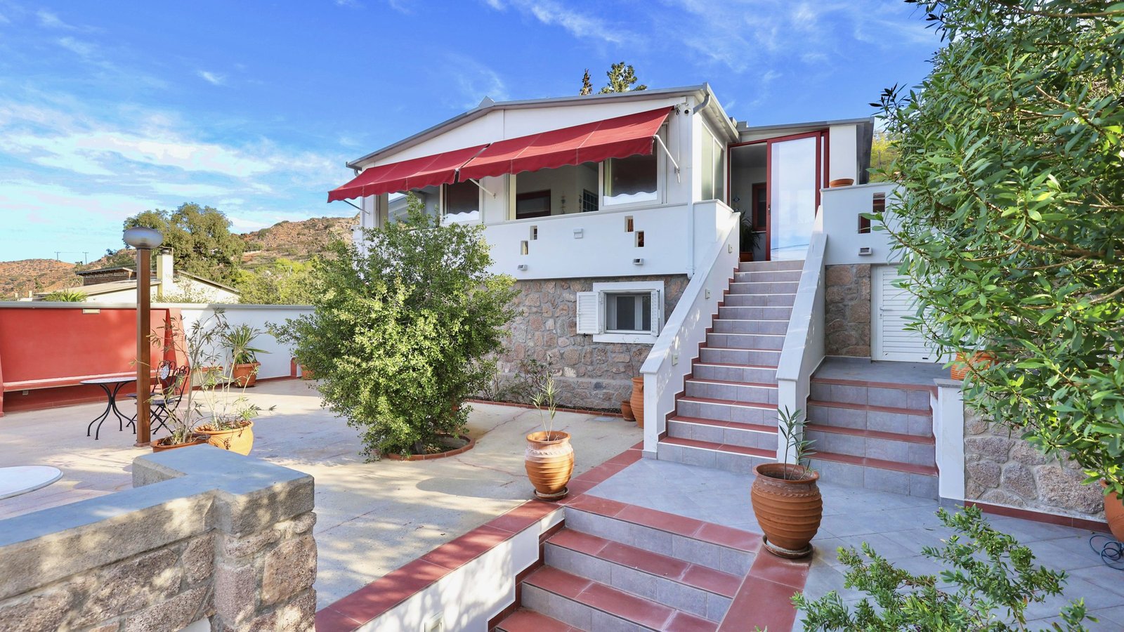 Exterior of the house with seating area